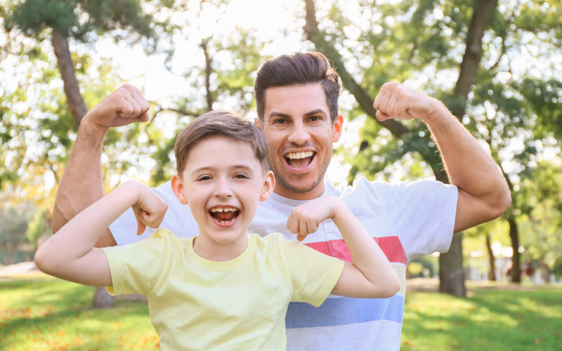 Safe Haven Sunday helps families stay strong in the fight against unsavory internet sites. In this picture, a father and son 'show off their muscles'.