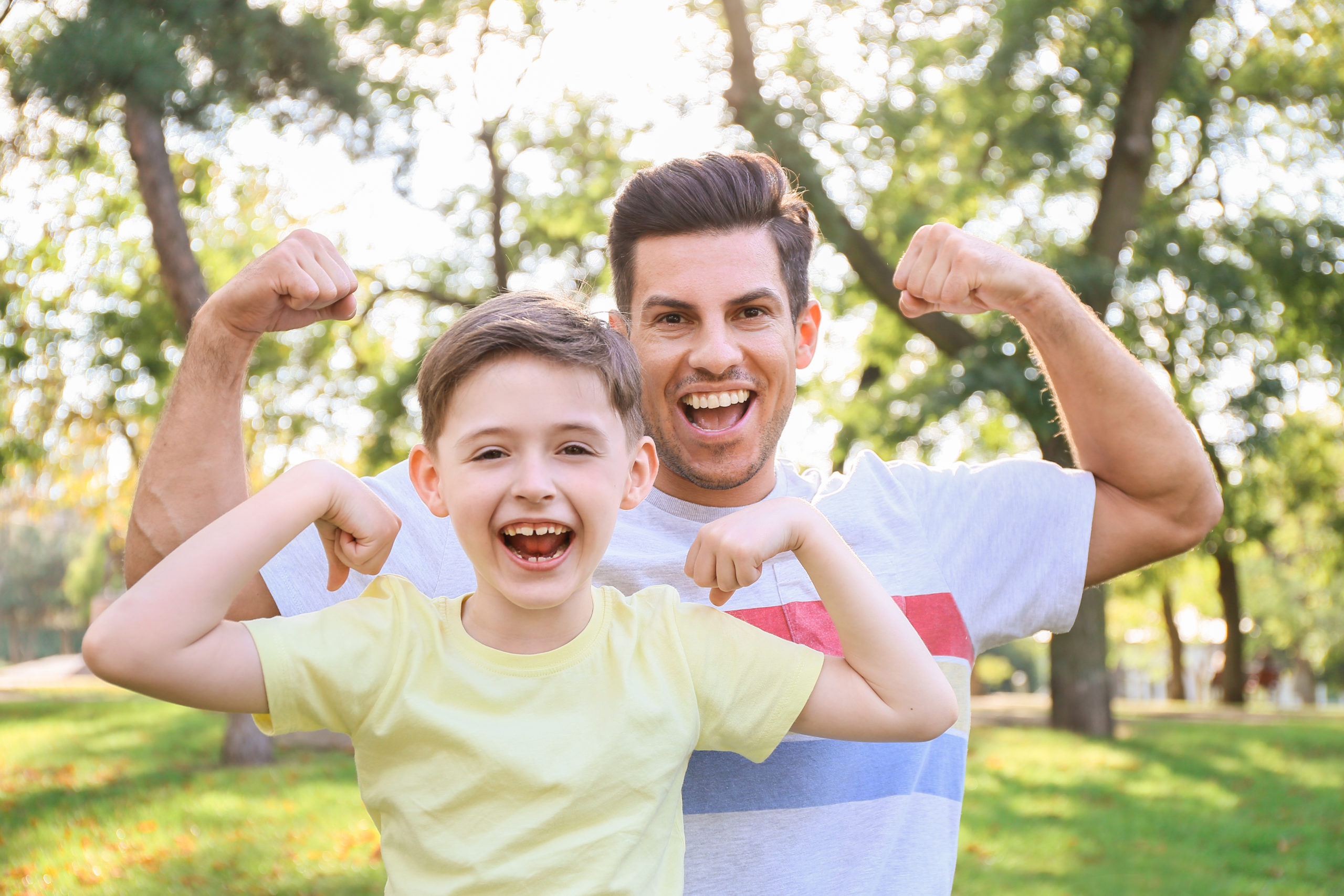 Safe Haven Sunday helps families stay strong in the fight against unsavory internet sites. In this picture, a father and son 'show off their muscles'.